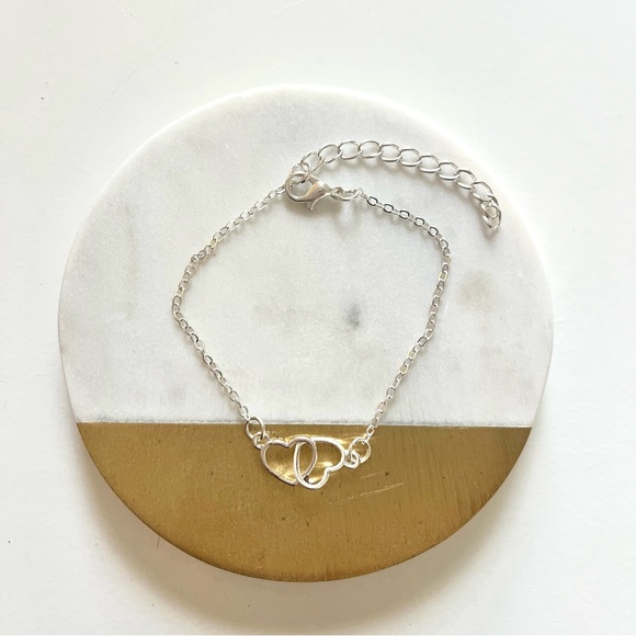 Silver Tone and Costume Jewelry Bracelet with Interlocking Hearts - Picture 2 of 3